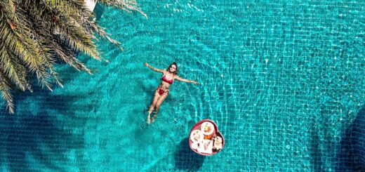 nirvana resort girl floating in pool jpg