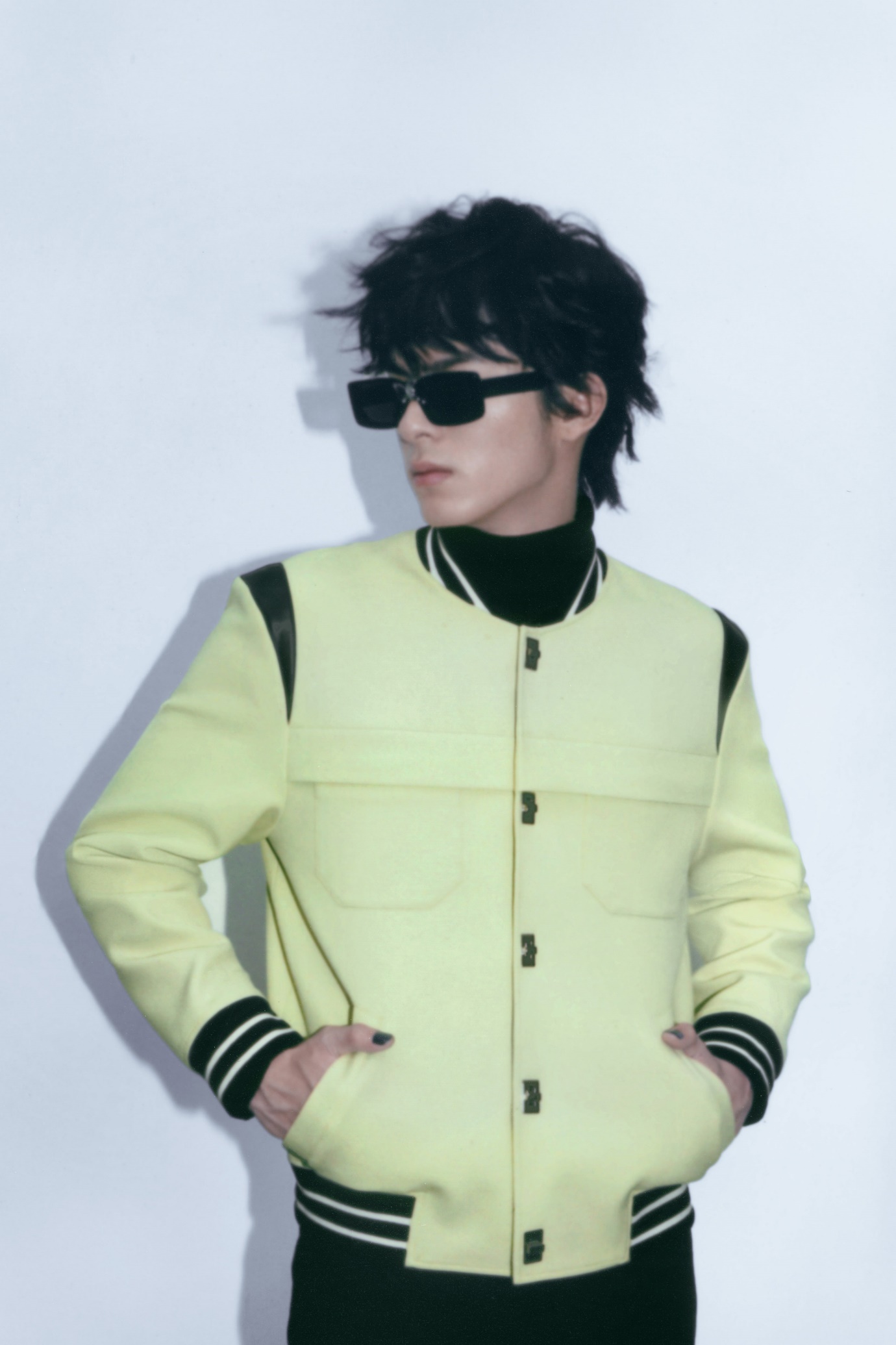 Image may contain Clothing Apparel Sunglasses Accessories Accessory Human Person Jacket Coat and Blazer