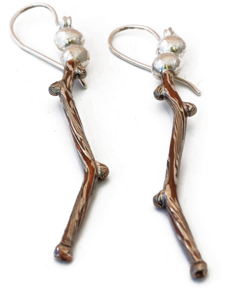 wr metalarts earrings sustainable val day twig cropped.png