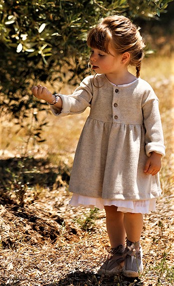 LA mart baby dress on in the family cropped.jpg