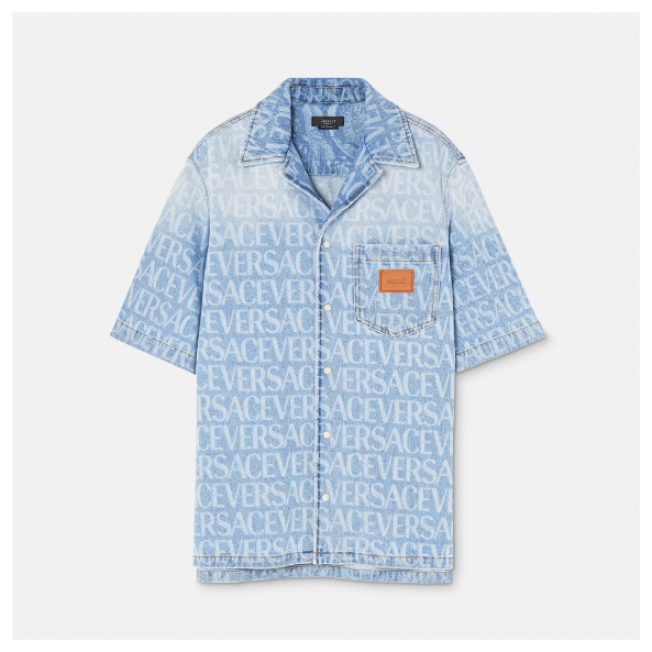 A blue shirt with white text Description automatically generated