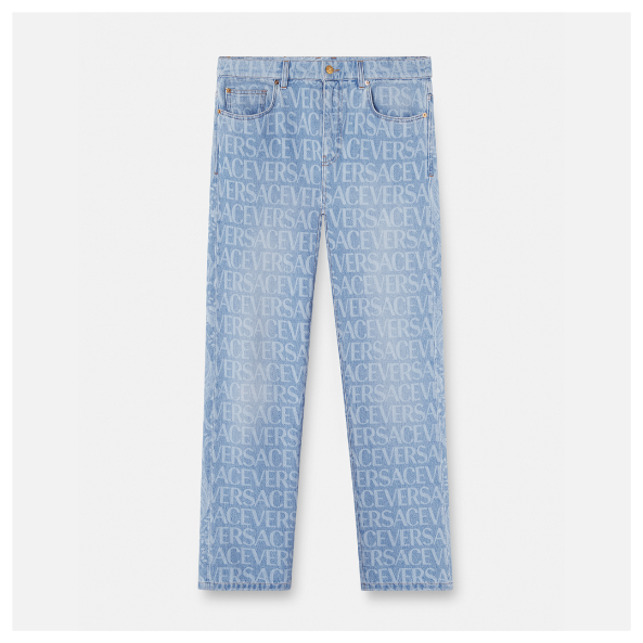 A pair of blue jeans with white text Description automatically generated