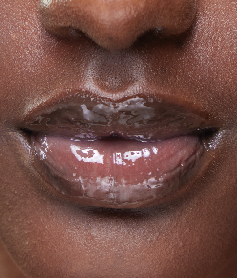 Close up of a person's lipsDescription automatically generated