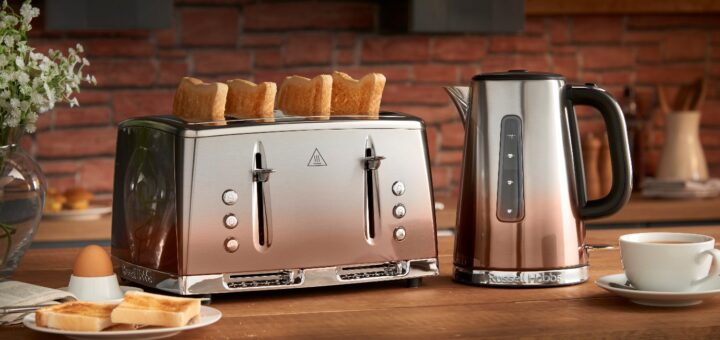 a toaster with toast on top of it description aut
