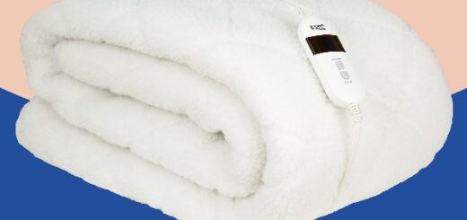 a white blanket with a digital thermometer descri 2