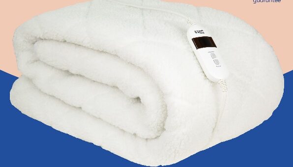 a white blanket with a digital thermometer descri 2