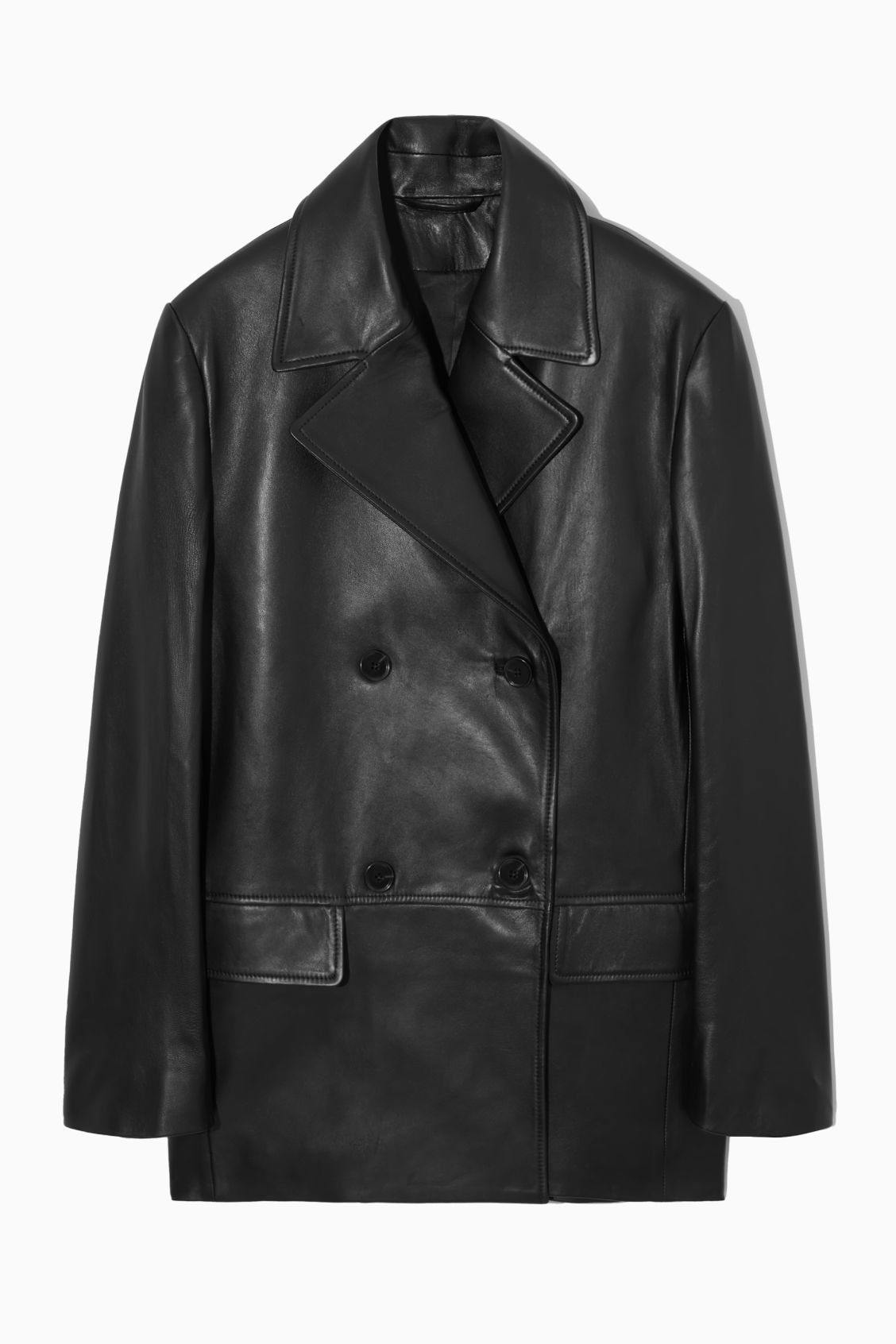 A black leather coat on a swinger Description automatically generated