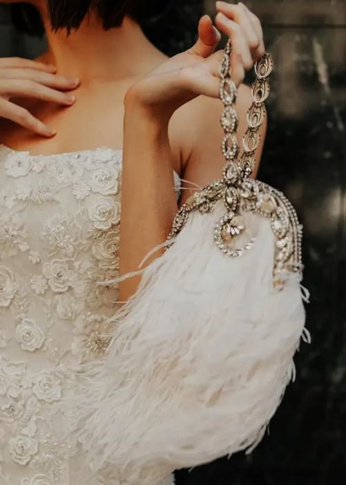 Bridal 2025 ME feather purse ropped.jpg