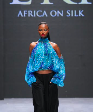 Elegance is a sea-green floaty blouse. At Eki Silk