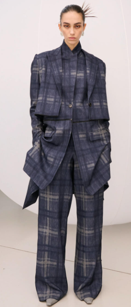 Multi-layered plaid suit by Qasimi.